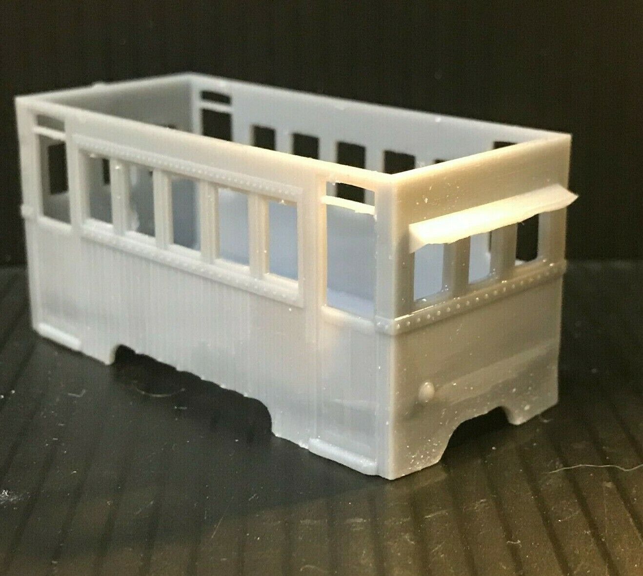 Unpainted OO9 narrow gauge prototype railbus body, roof and interior kit designed to fit a KATO 103, 109 or 105 chassis.