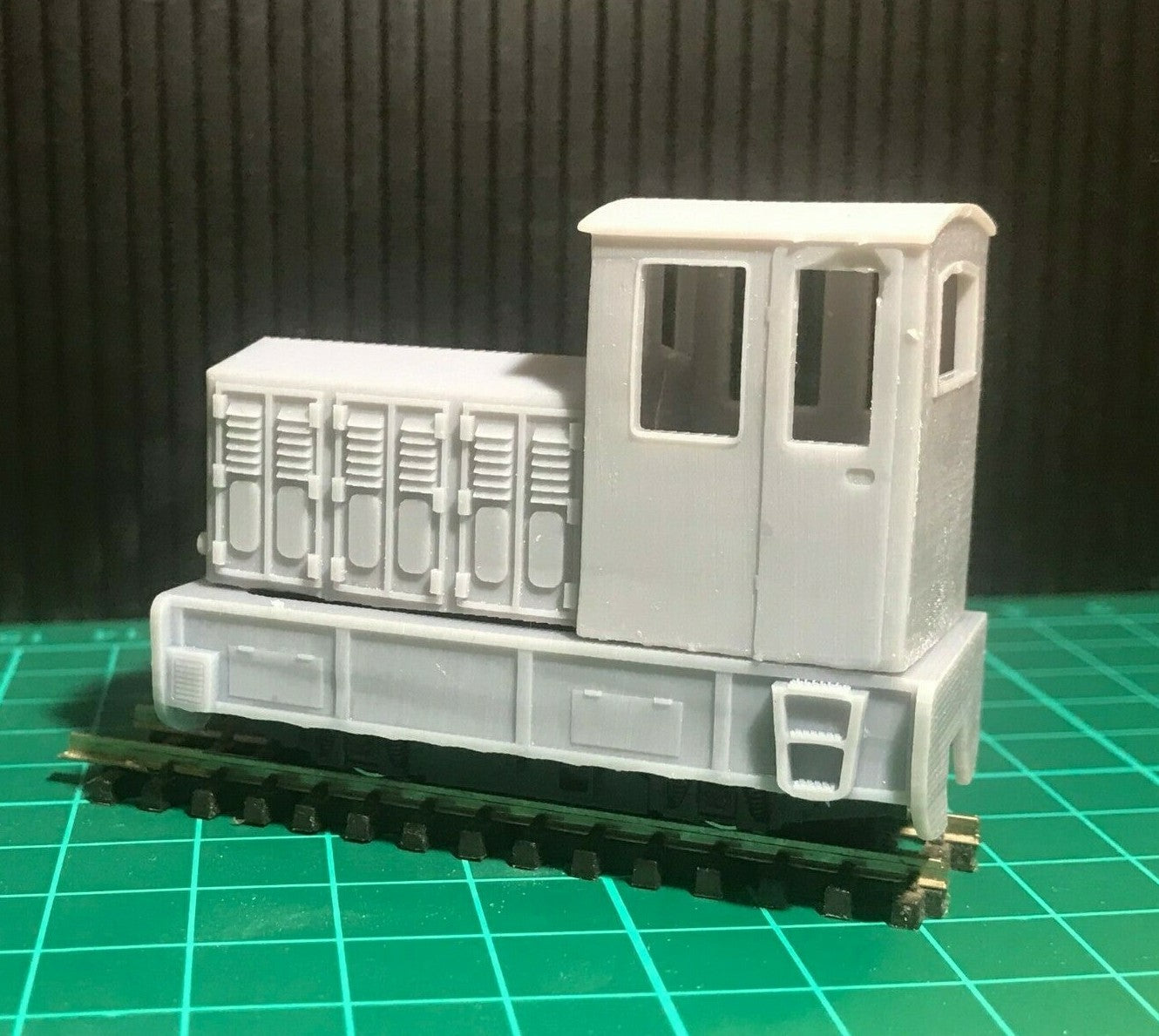 OO9 narrow gauge diesel shunter body kit shown mounted on a Kato 11-109 009 chassis, ready for painting and detailing