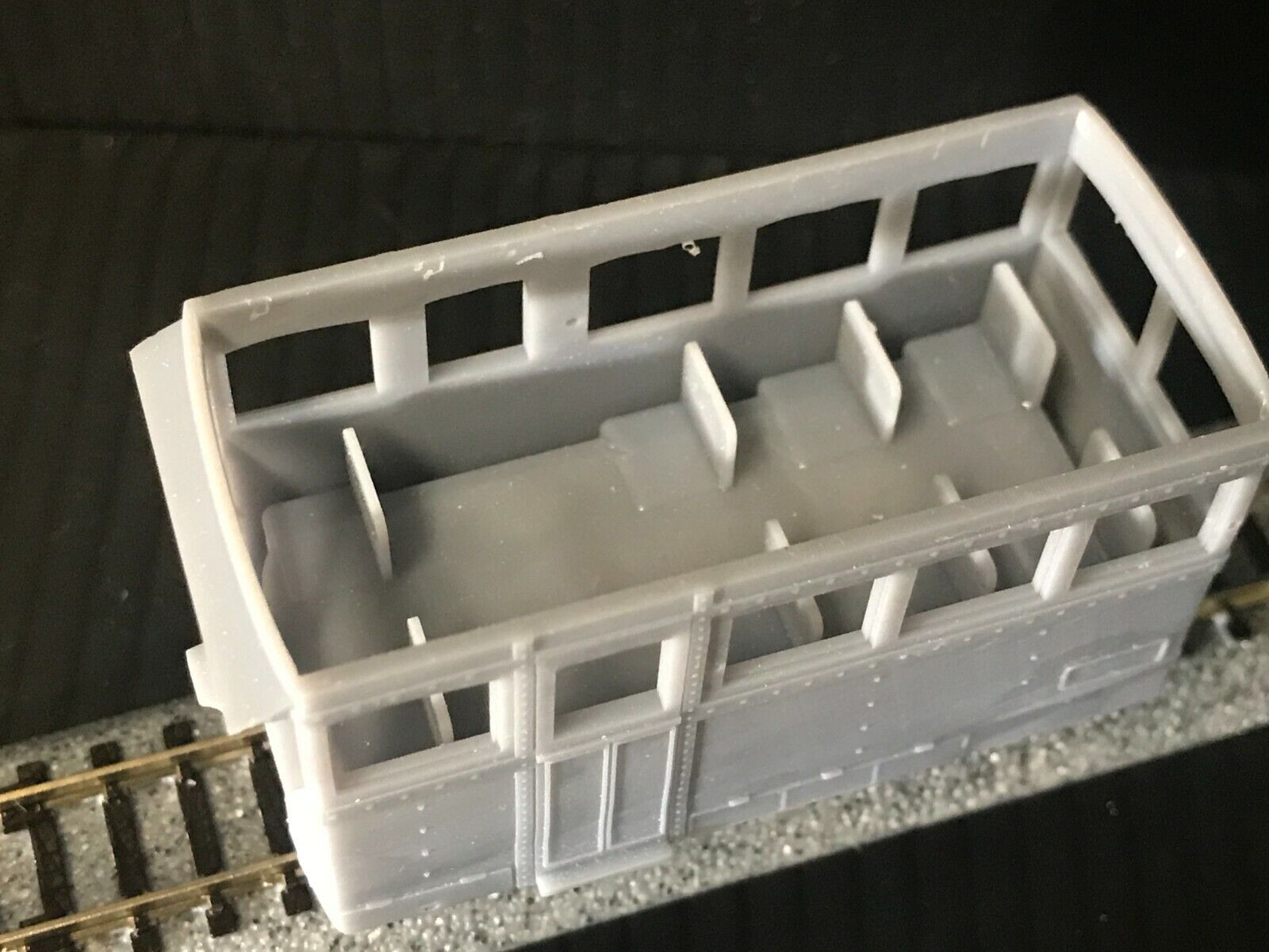 OO9 narrow gauge prototype tram railcar body kit shown on Kato 103/109/105 chassis with removable roof and interior seating