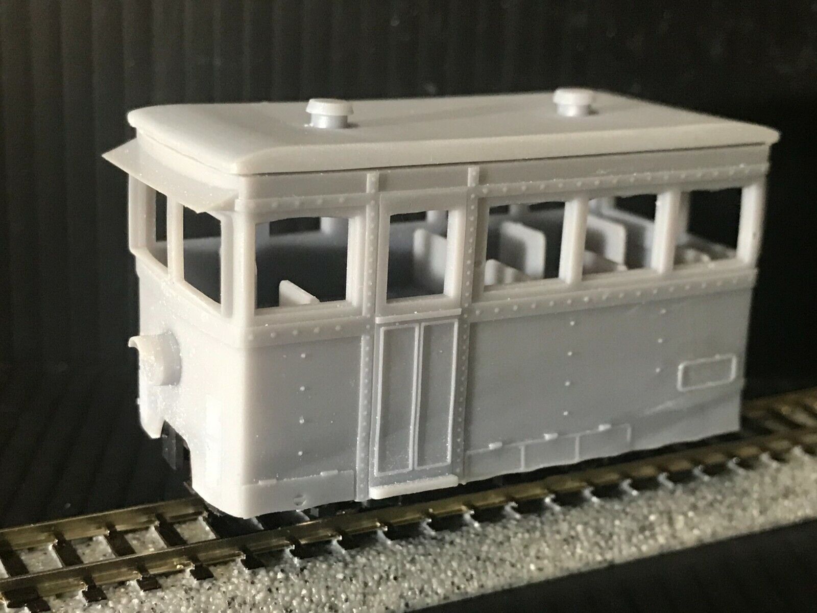 OO9 narrow gauge prototype tram railcar body kit shown fitted to a Kato 103/109/105 chassis with removable roof and interior seating