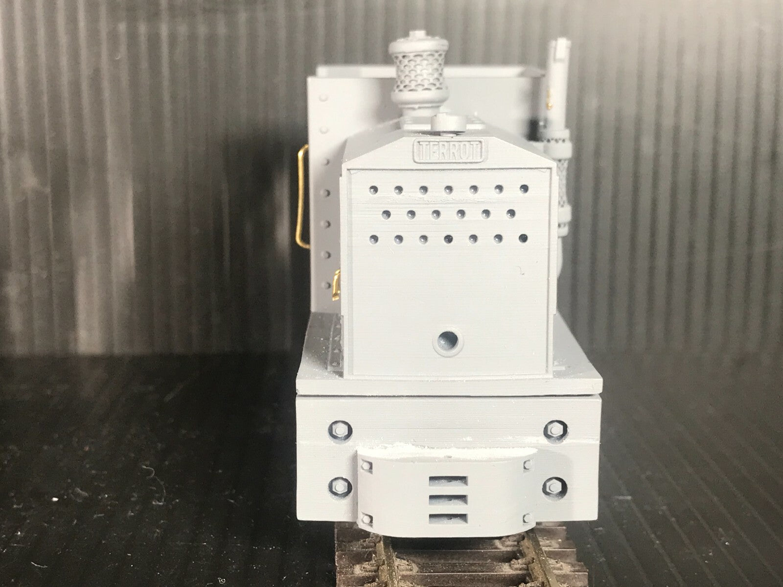 Unpainted GN15 diesel critter locomotive kit in G scale for 00 gauge track, shown on a Tenshodo motor bogie chassis