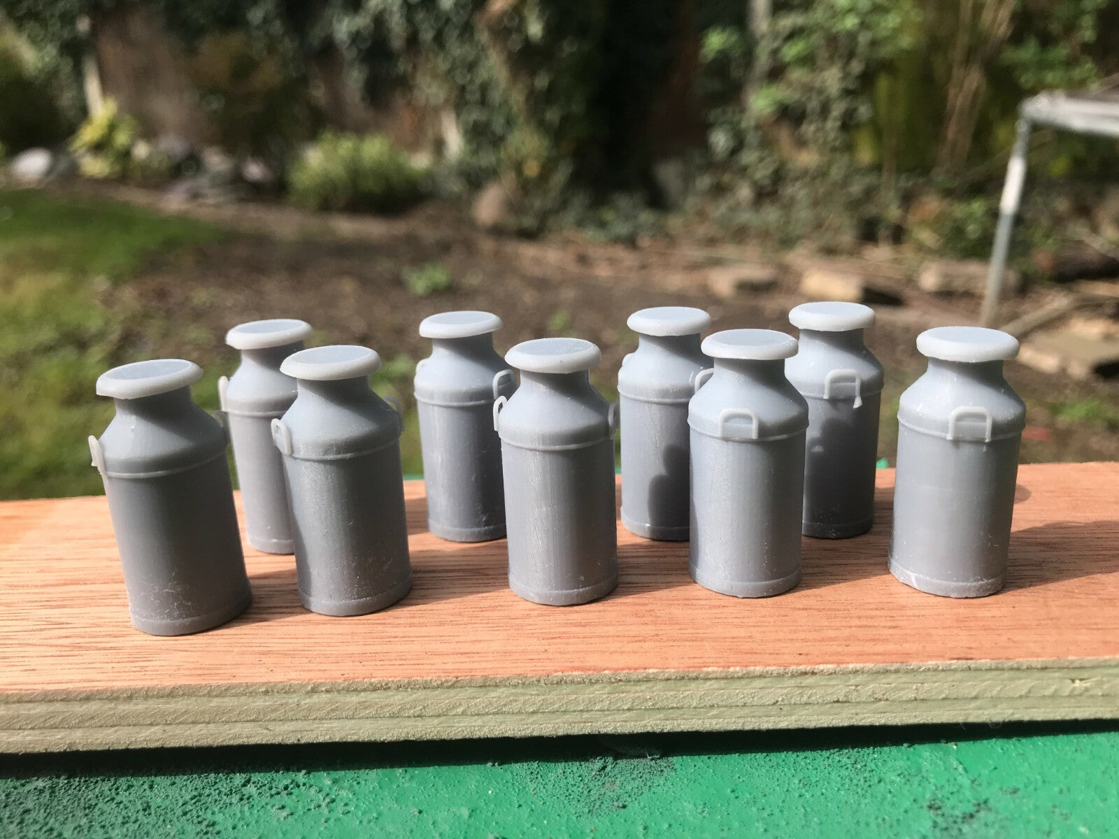 G-scale model railway scenery set of nine milk churns, also suitable for GN15 layouts and wagon loads