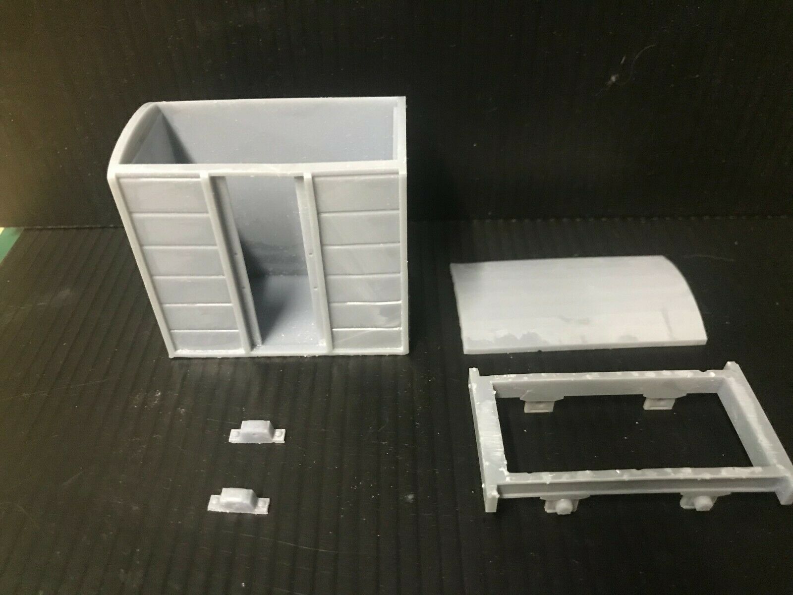 Gn15 narrow gauge box van kit shown assembled with bogie frame and optional 12.5mm wheelsets for model railway layouts