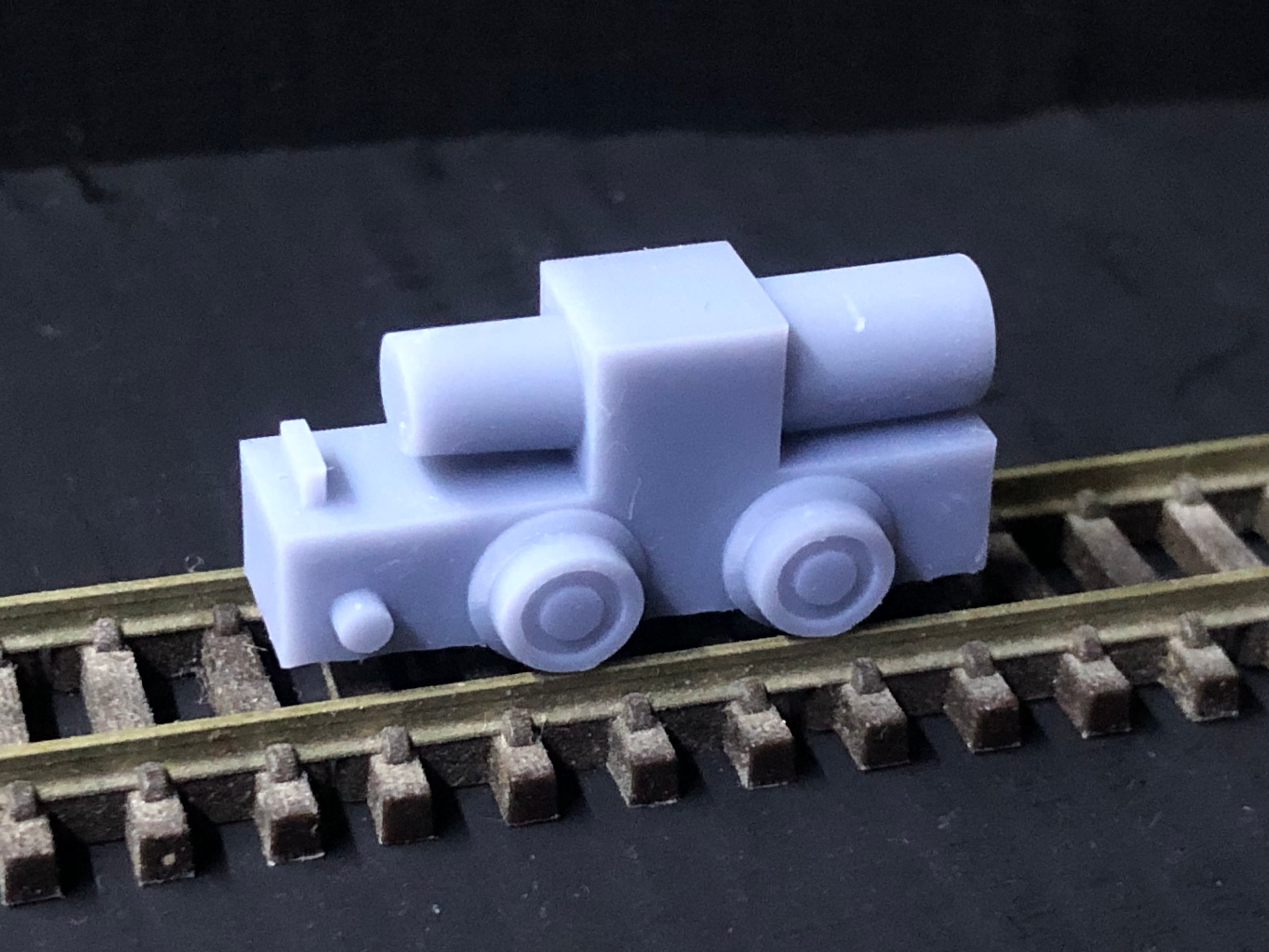 OO9 scale resin kit of a WW1 Baguley 10HP petrol locomotive with dummy chassis and 3D-scanned driver for static display