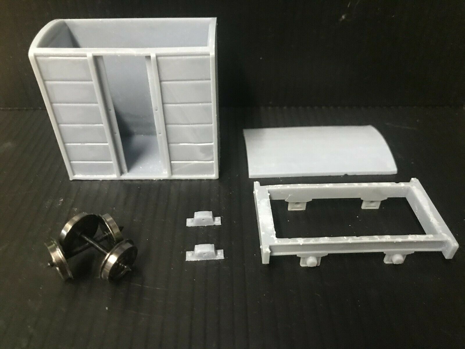 Gn15 narrow gauge box van kit shown assembled with bogie frame and optional 12.5mm wheelsets for model railway layouts