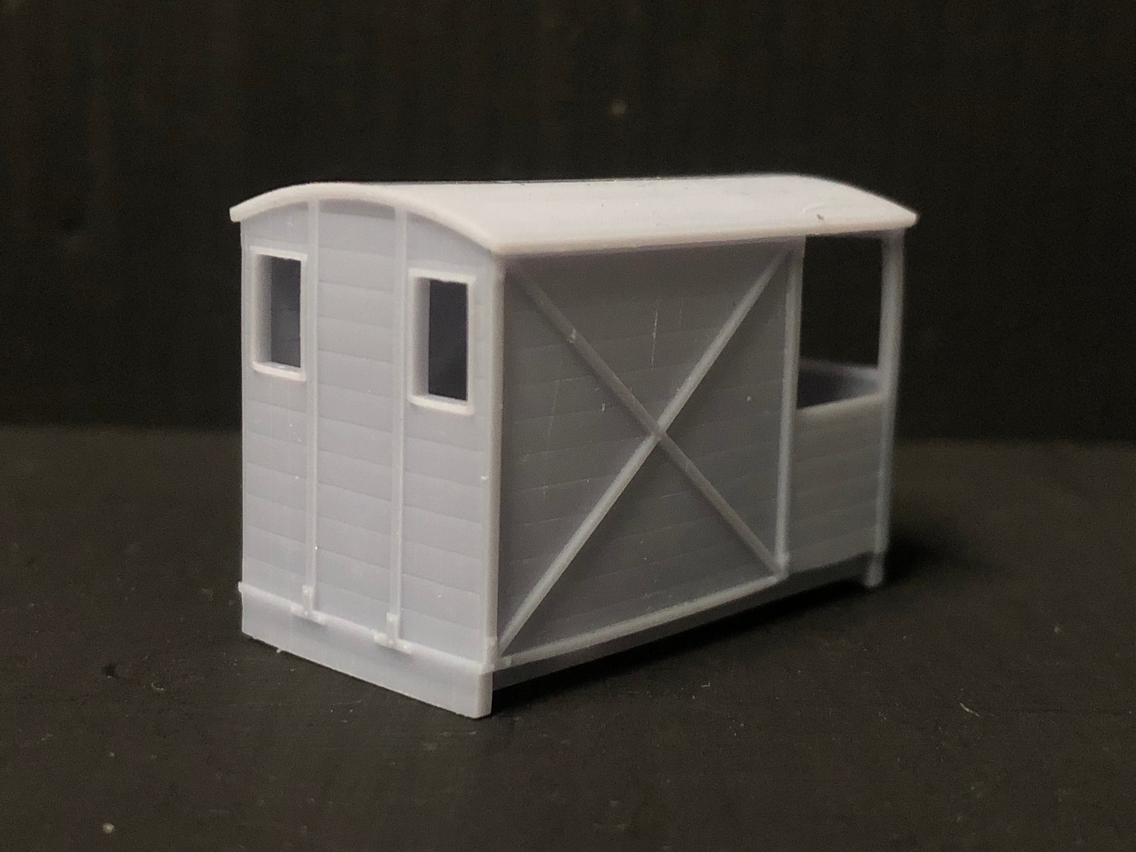 OO9 narrow gauge resin guards van body kit shown fitted to a Peco NR-121D 10ft wheelbase chassis for model railways