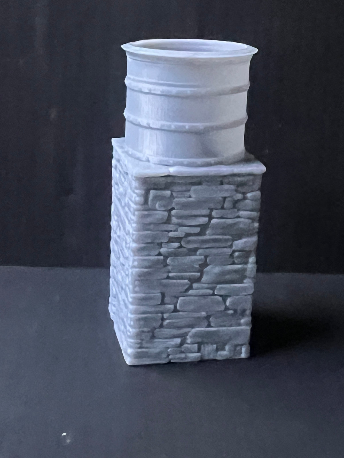 Narrow Gauge Round water tank on stone building