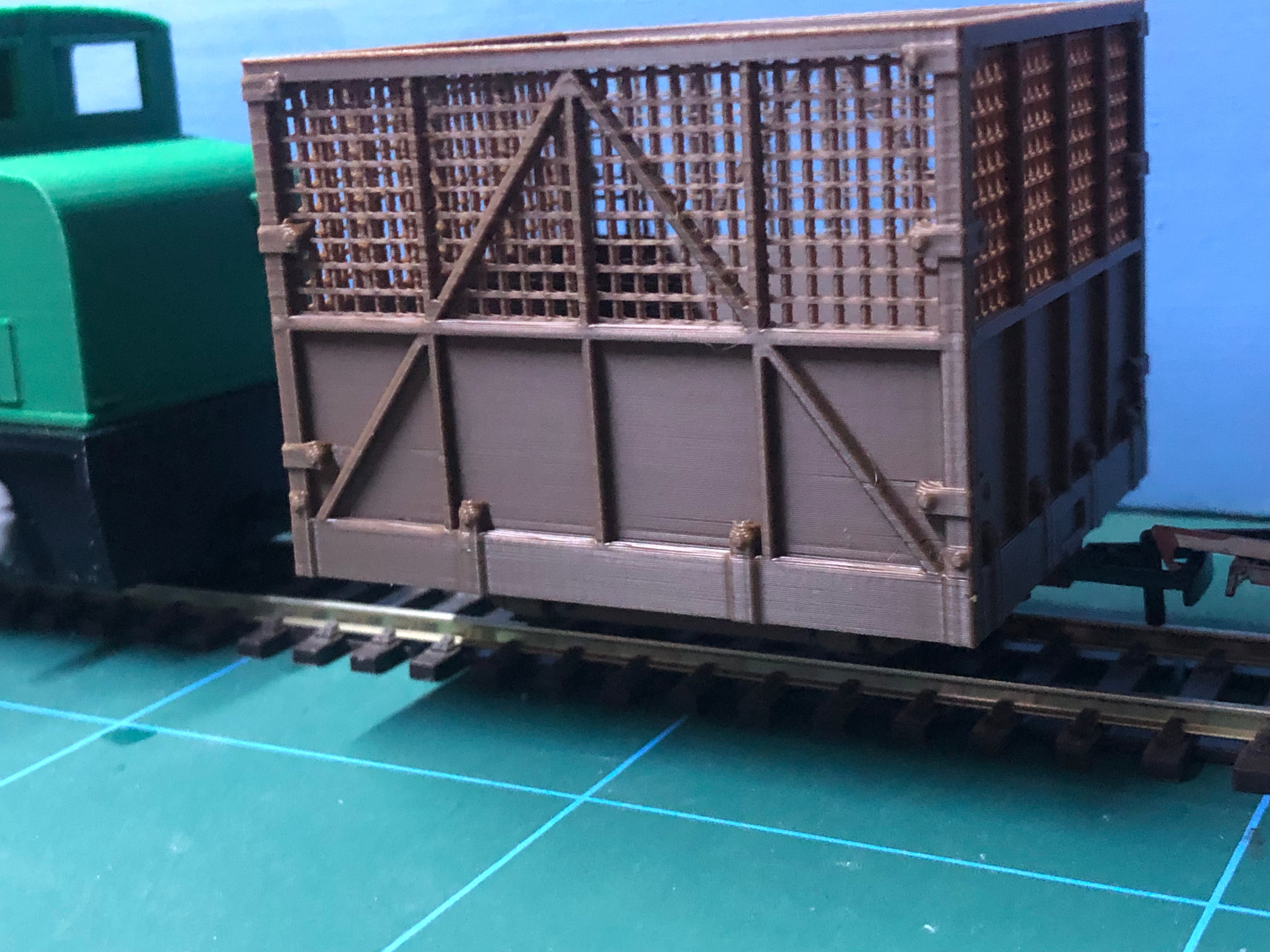 O-16.5 / NG7 narrow gauge 4 ton sugar cane bin wagon kit with pre-coloured body and POM wheelsets shown assembled on track