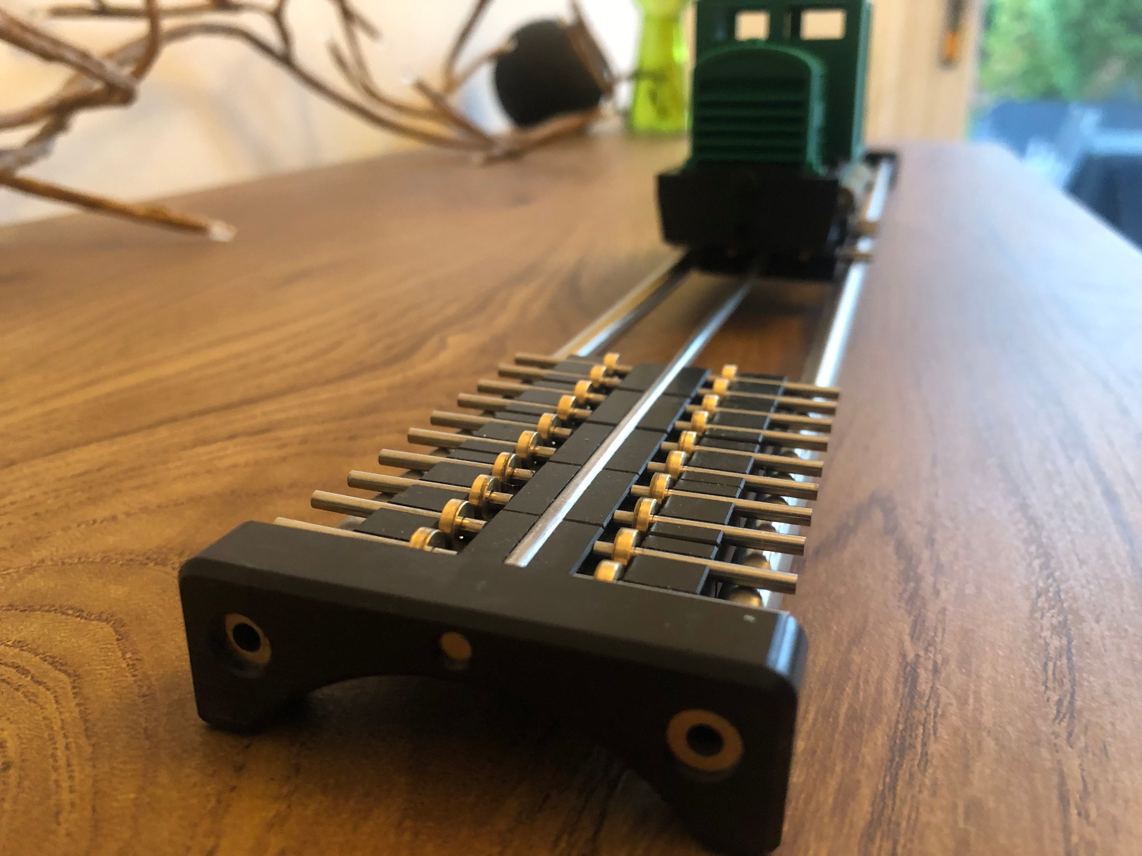 OO gauge rolling road with eight axle supports for testing and running in model locomotives, also suitable for O16.5, NG7 and GN15 scales