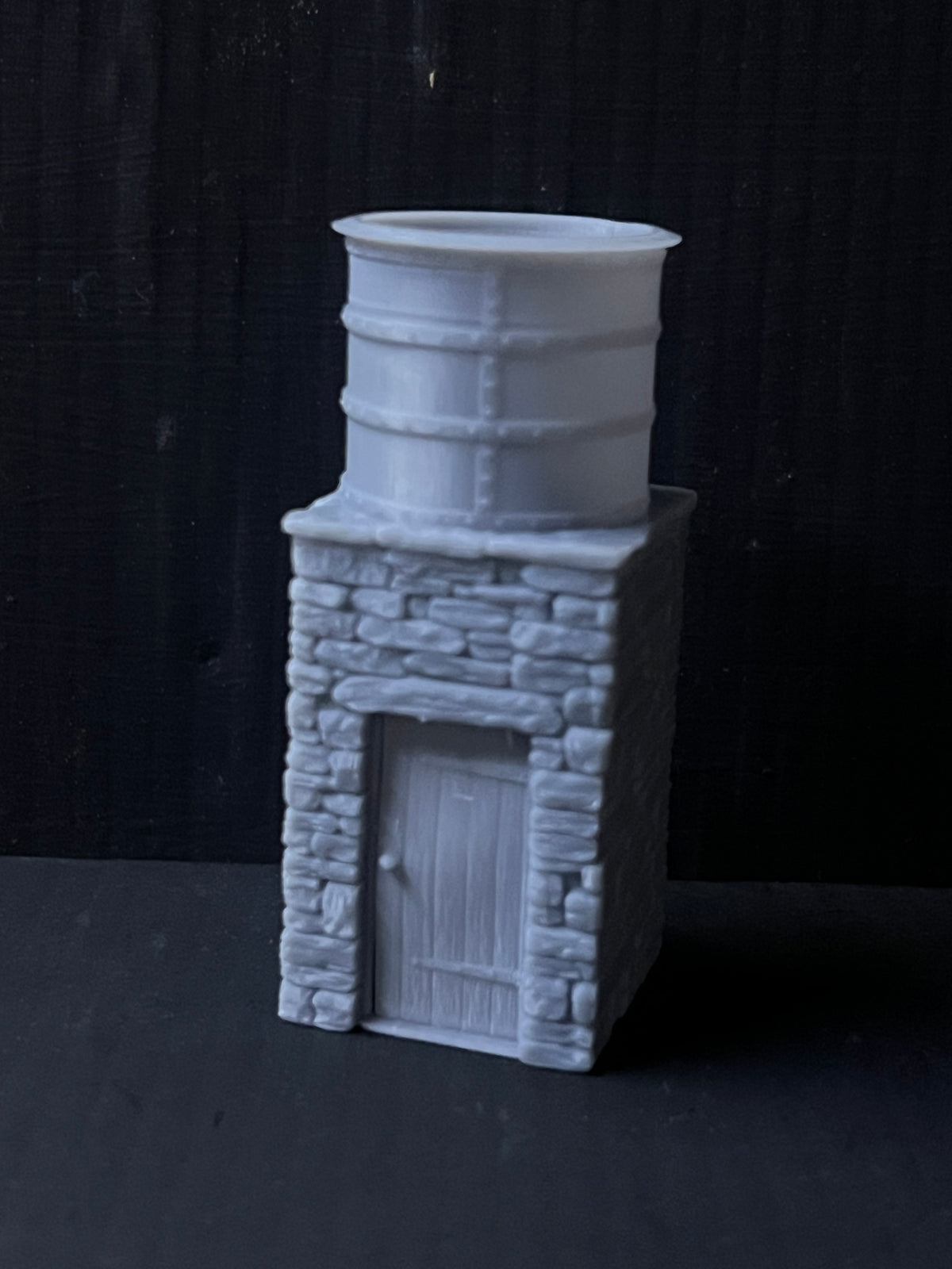 Narrow Gauge Round water tank on stone building
