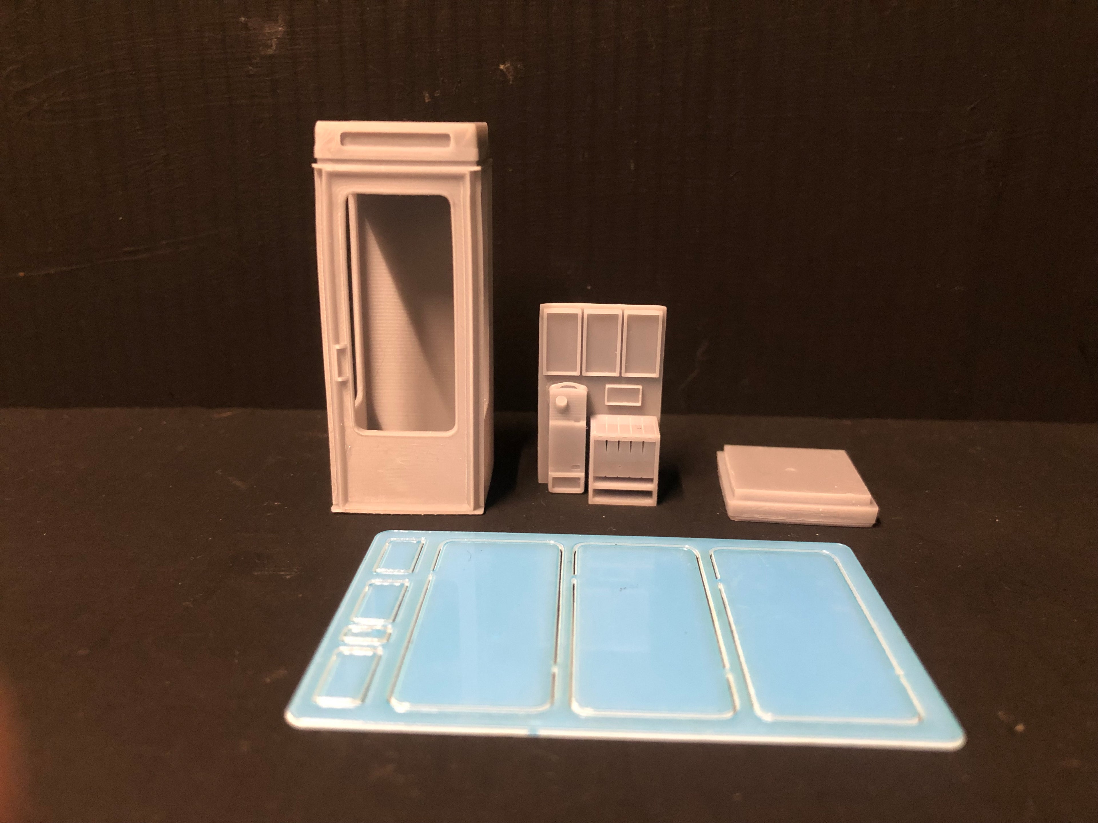 Unpainted 7mm O gauge K8 1970s British telephone box model kit with glazing and interior detail for NG7 and On18 layouts