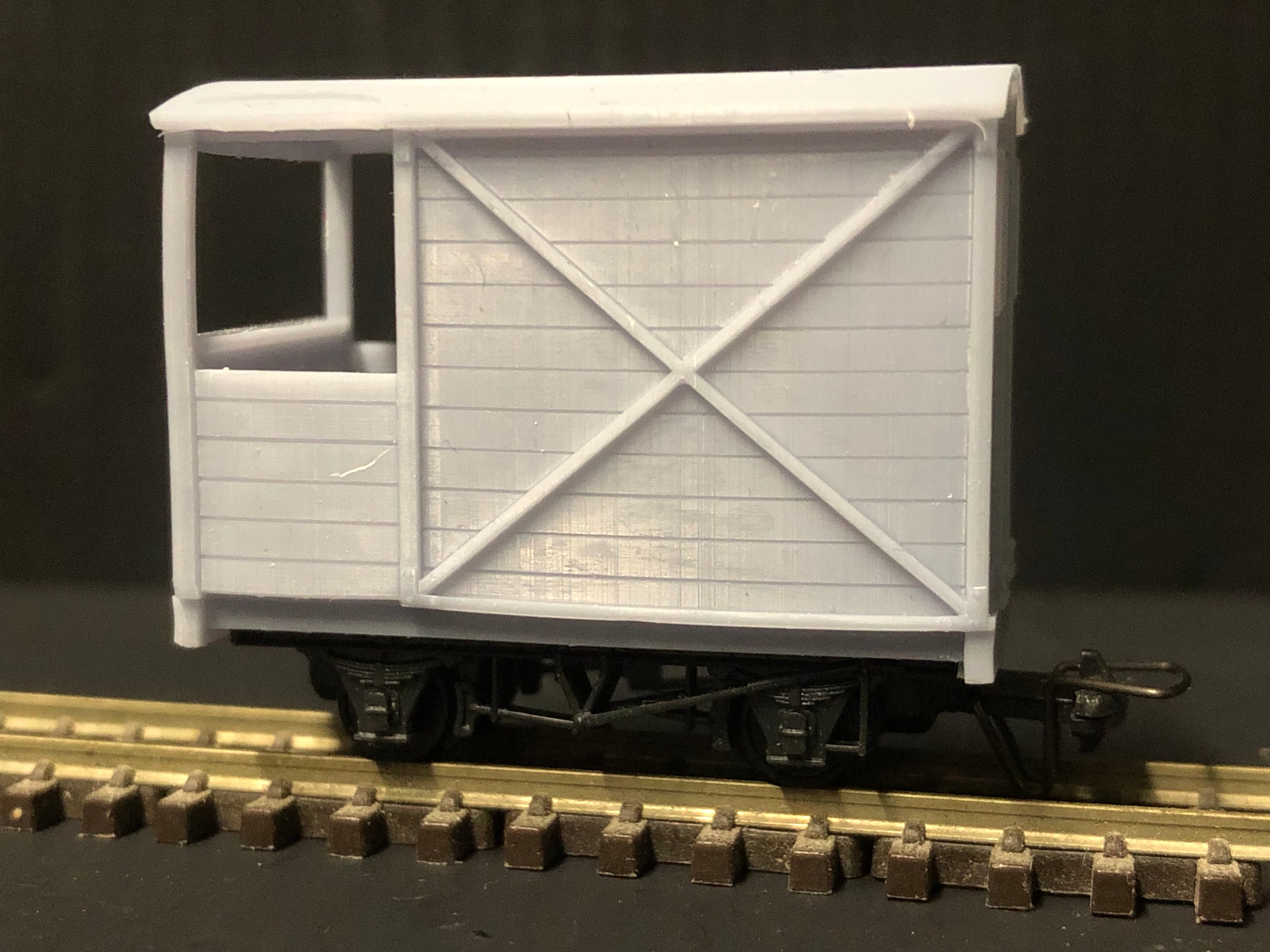 OO9 narrow gauge resin guards van body kit shown fitted to a Peco NR-121D 10ft wheelbase chassis for model railways
