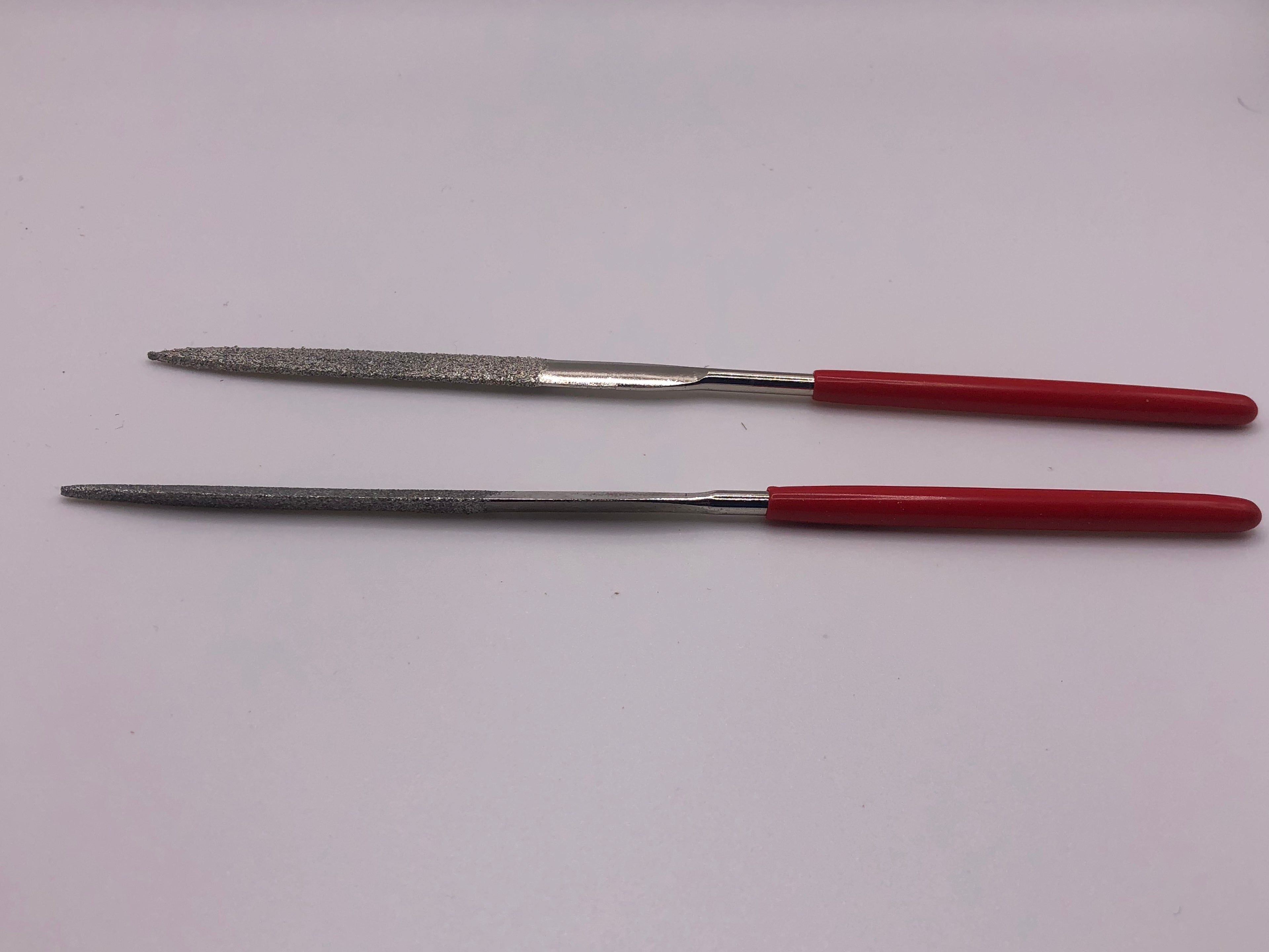 Set of 10 diamond needle files, 140mm precision tools for fine metal, glass and modelling work, shown in assorted profiles.