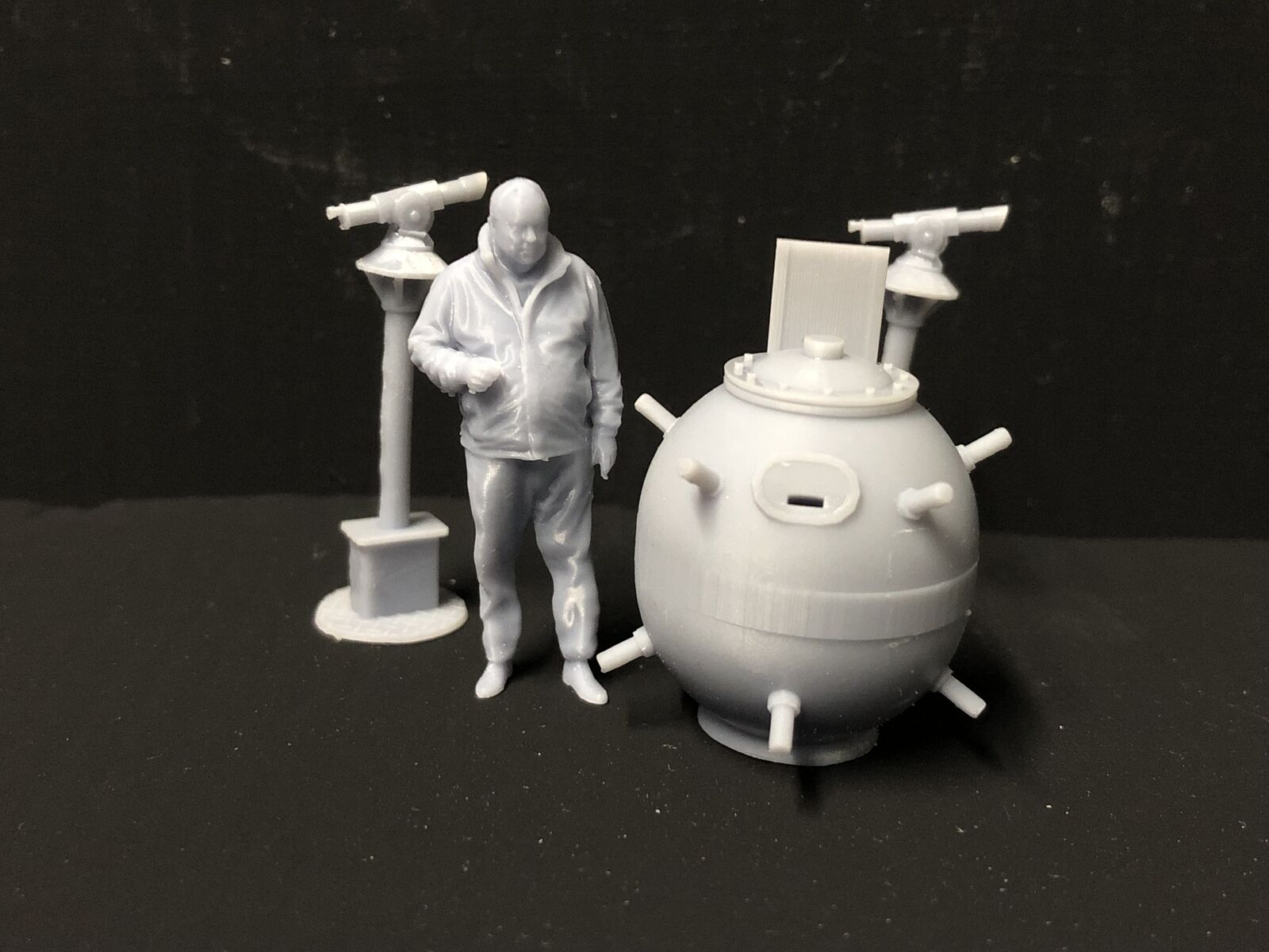 Gauge 1 (1/32) unpainted model railway seaside charity sea mine with promenade telescopes, supplied as a detail kit.