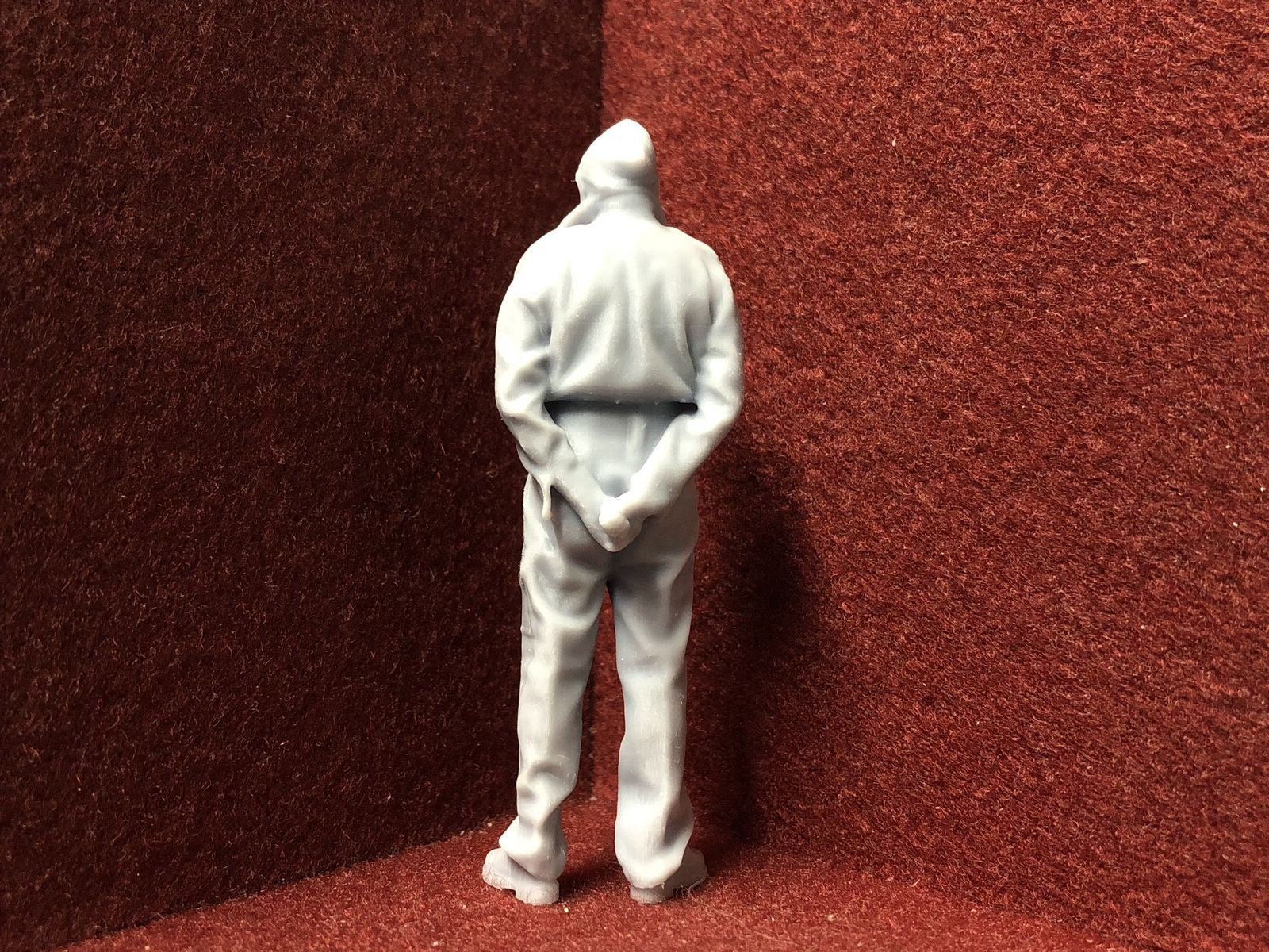 Unpainted G-scale 1:22 figure of a man in military-style uniform for GN15 narrow gauge model railway layouts