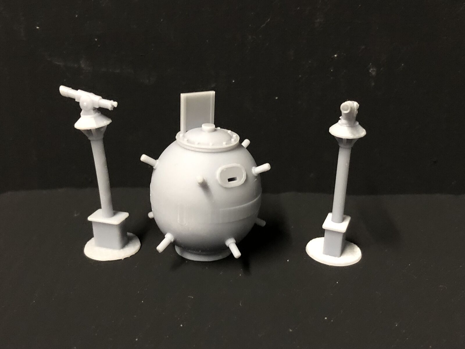 Gauge 1 (1/32) unpainted model railway seaside charity sea mine with promenade telescopes, supplied as a detailed display kit