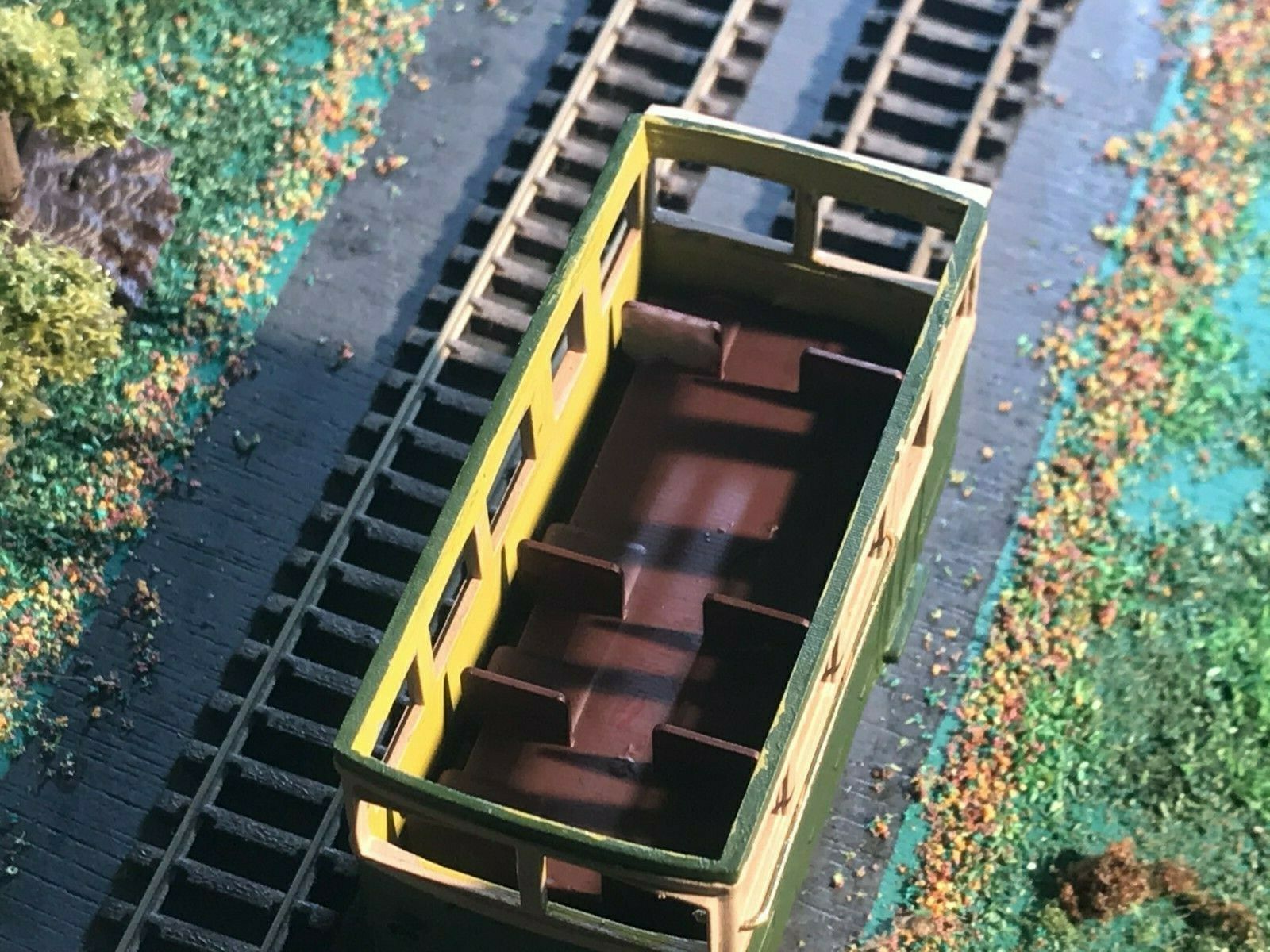 OO9 narrow gauge prototype tram railcar body kit shown on a Kato 103/109/105 chassis with separate roof and interior seating.