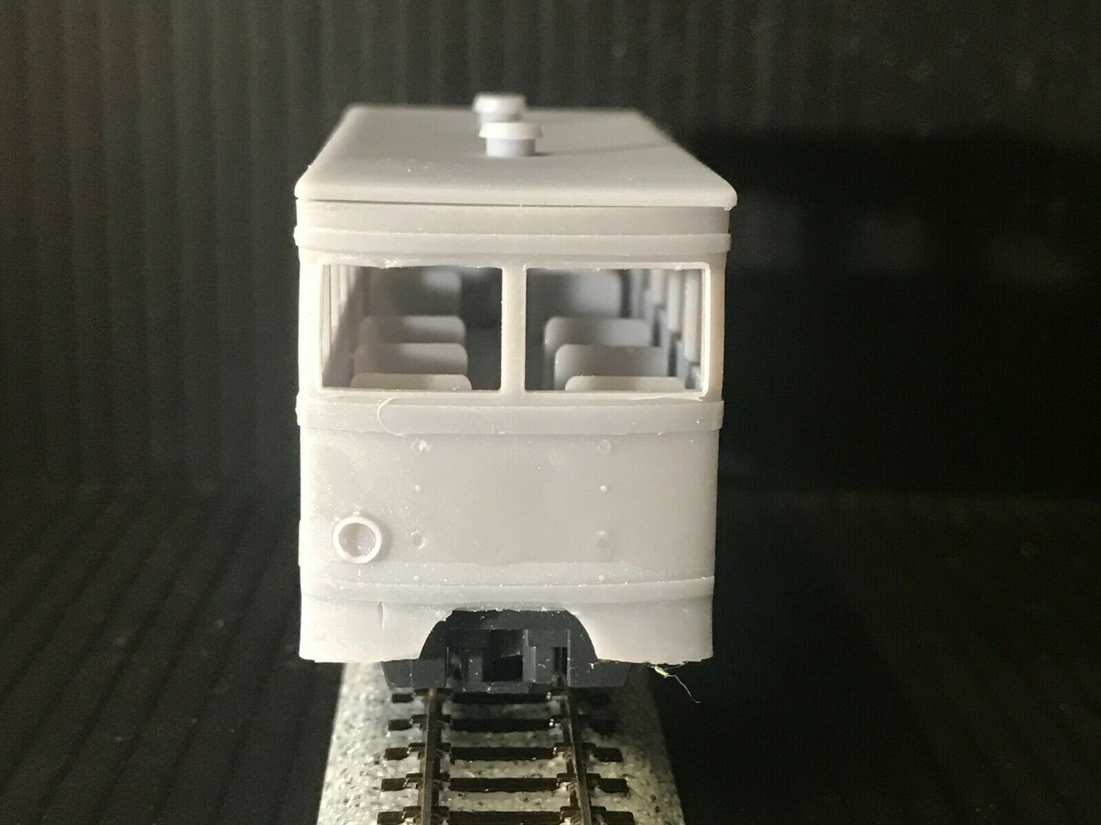 OO9 narrow gauge prototype tram railcar body kit shown on Kato 103/109/105 chassis with removable roof and interior seating
