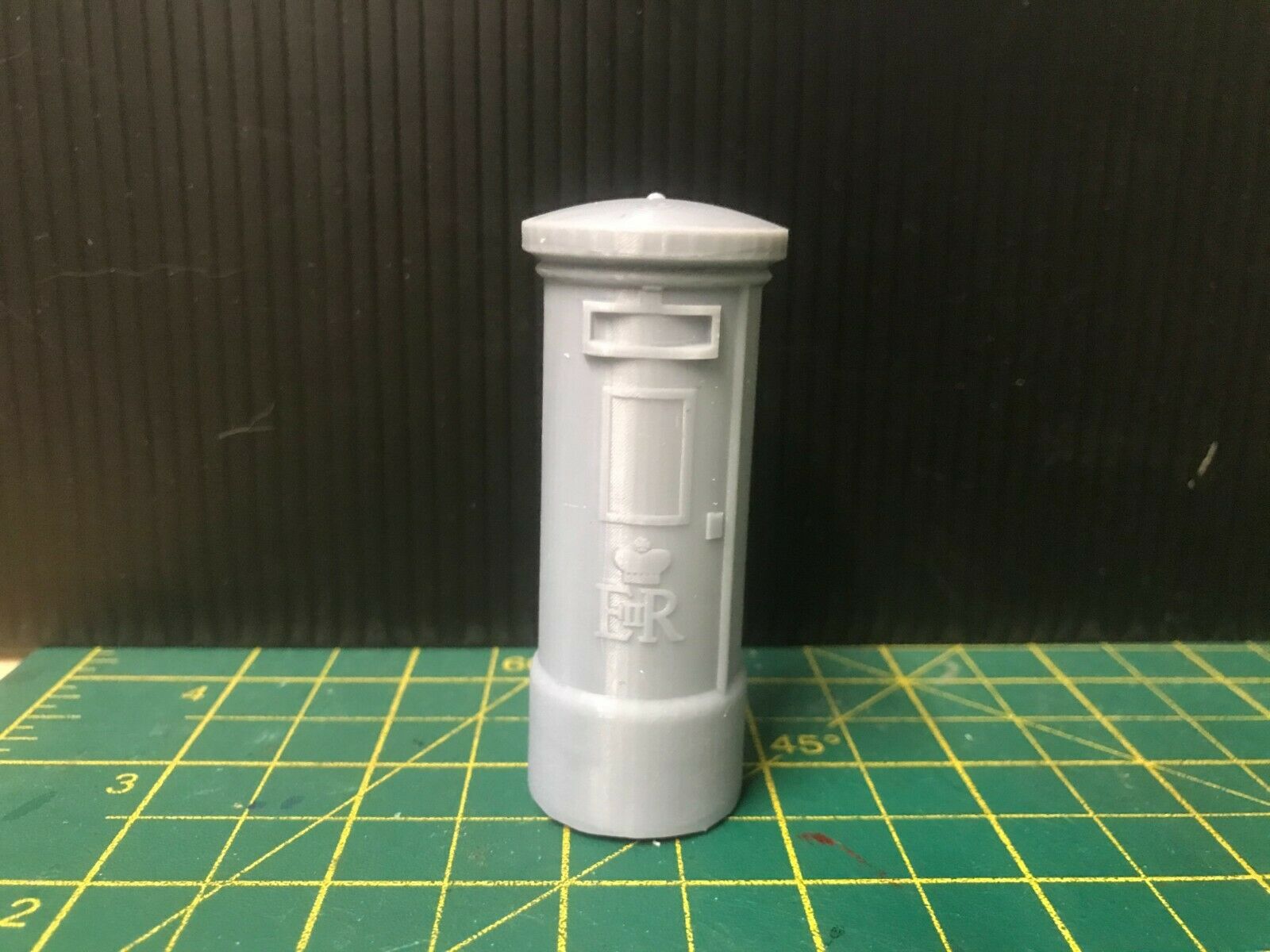 Unpainted G-scale and GN15 model railway scenery set with freestanding and wall-mounted postbox accessories