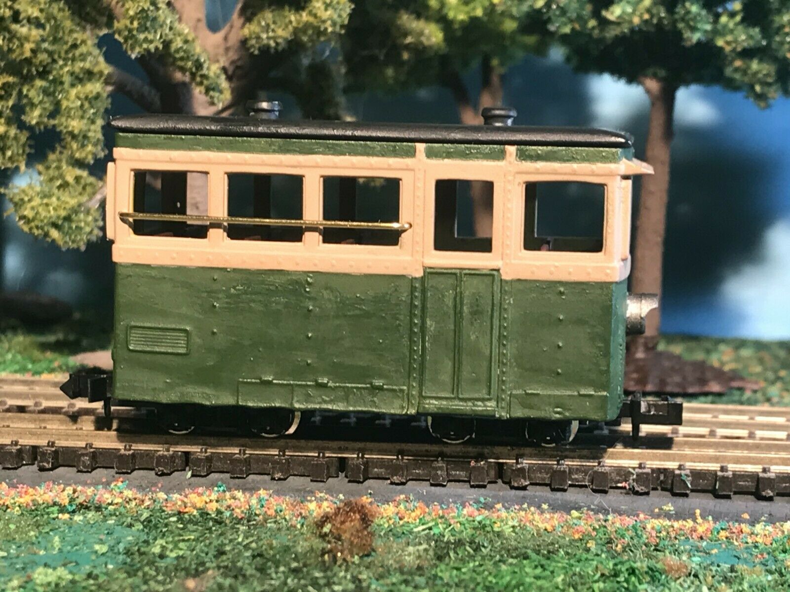 OO9 narrow gauge prototype tram railcar body kit shown on Kato 103/109/105 chassis with separate roof and interior seating