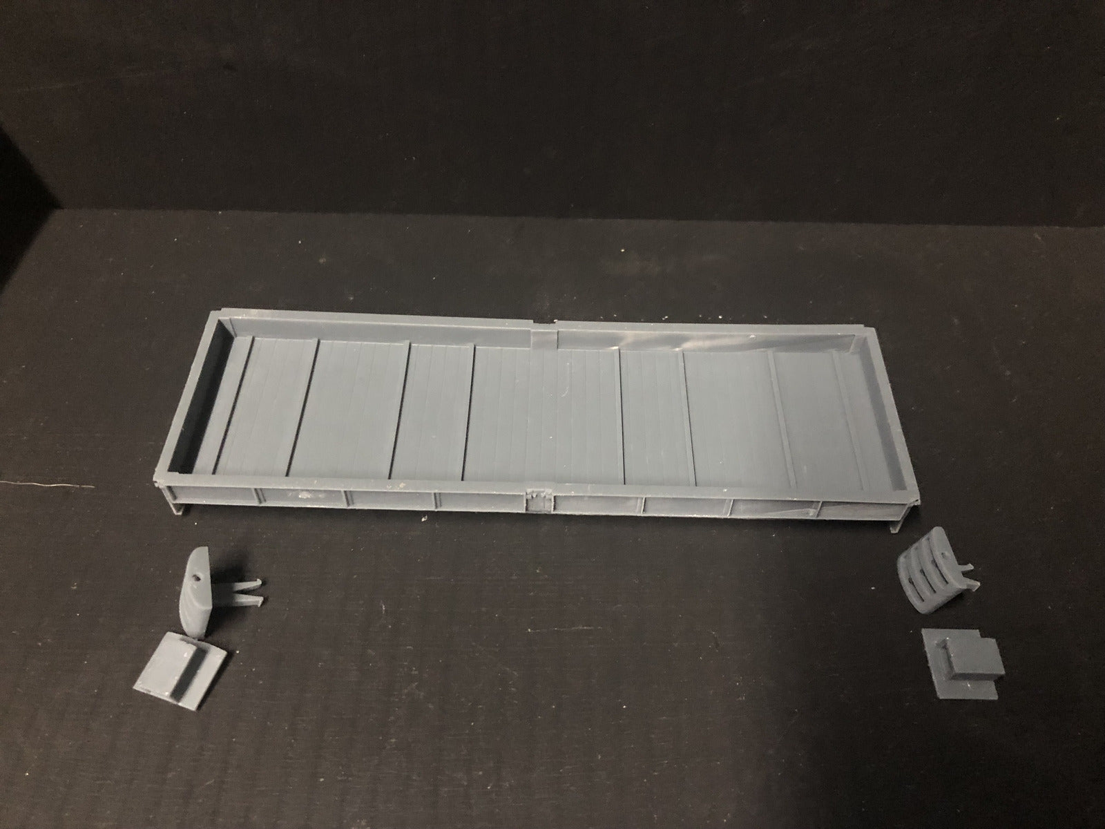 Gn15 narrow gauge bogie plate wagon kit with detailed chassis, supplied with bogie wheels and NEM coupling pockets