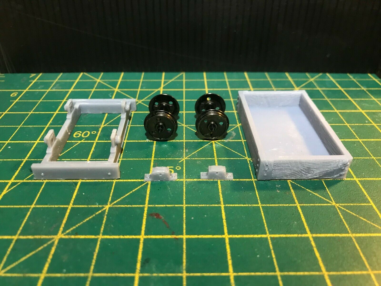 Gn15 narrow gauge single plank wagon kit shown with bogie frame and coupling blocks for 16.5mm track