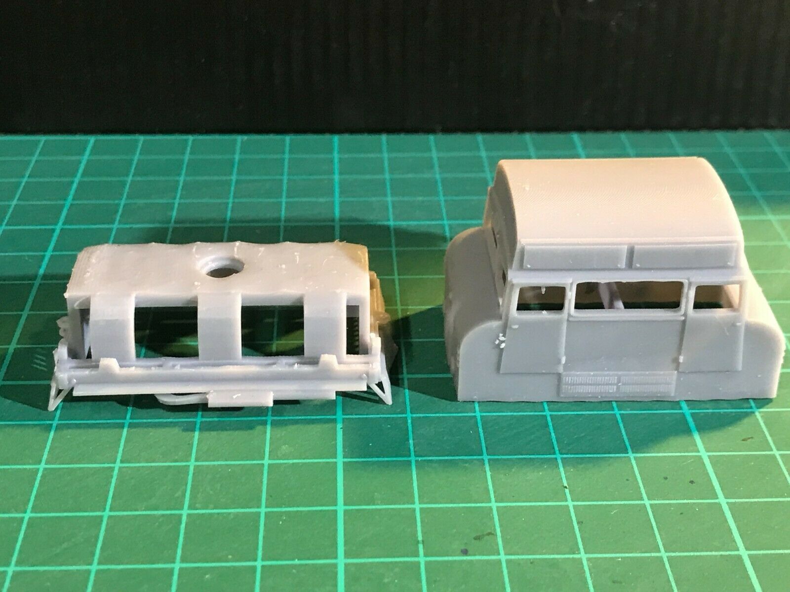 Unpainted OO gauge Wickham Type 42 inspection car body and sub-chassis kit shown on a Tenshodo Spud motor bogie chassis