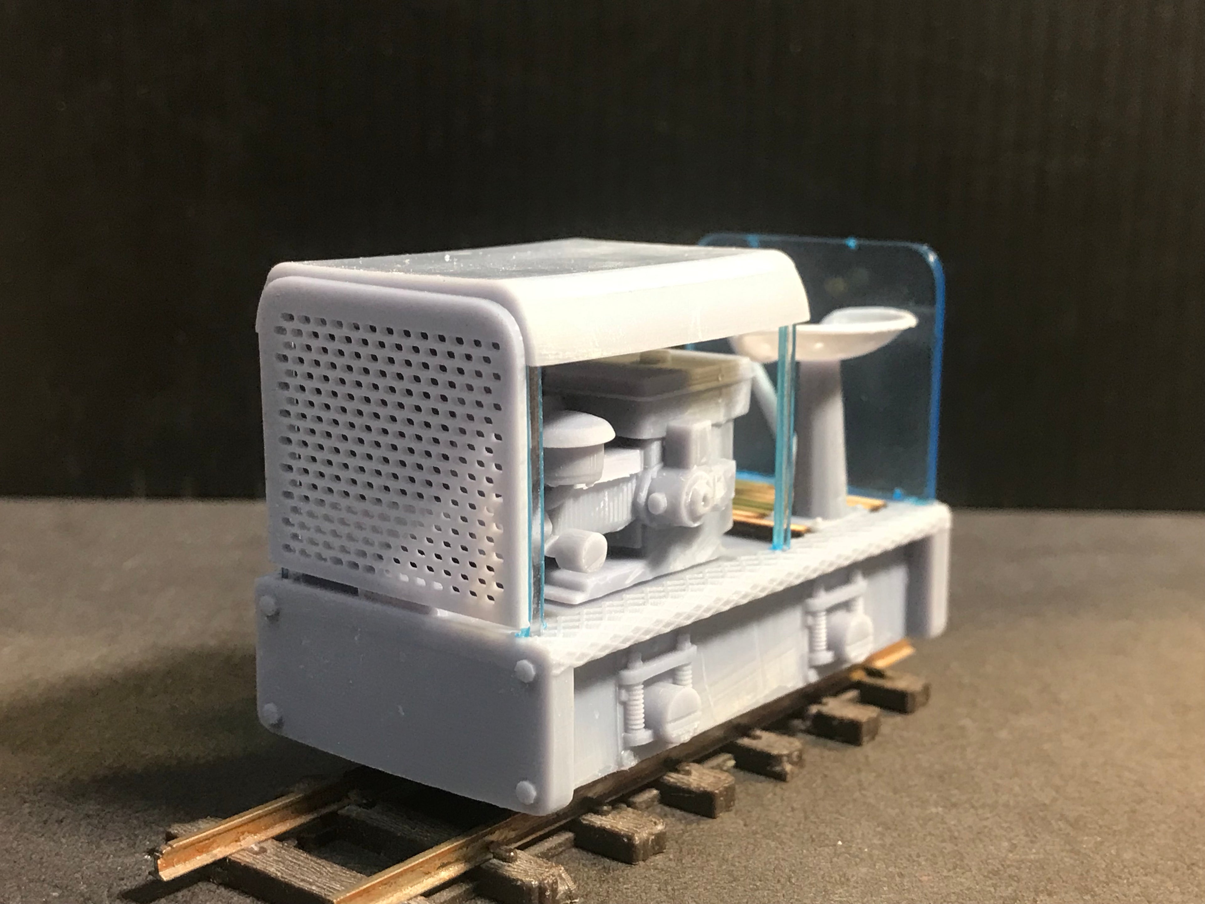 Unpainted GN15 diesel critter model railway kit, G-scale body for OO gauge track, shown with compatible Tenshodo spud chassis
