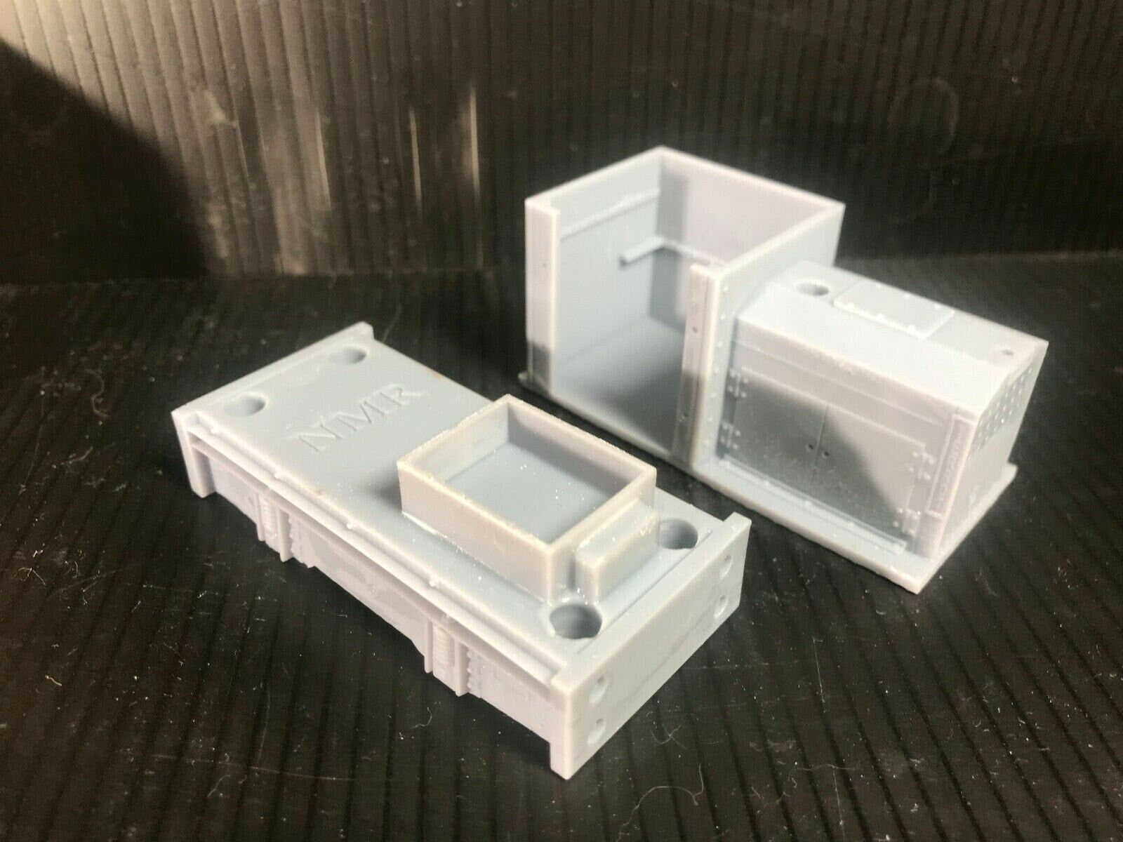 Unpainted GN15 diesel critter locomotive kit for G scale on 00 gauge track, shown with a Tenshodo spud motor bogie chassis