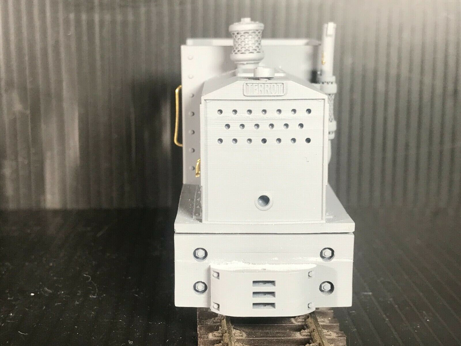 Unpainted GN15 diesel critter locomotive kit for G scale on 00 gauge track, shown on a Tenshodo spud motor bogie chassis